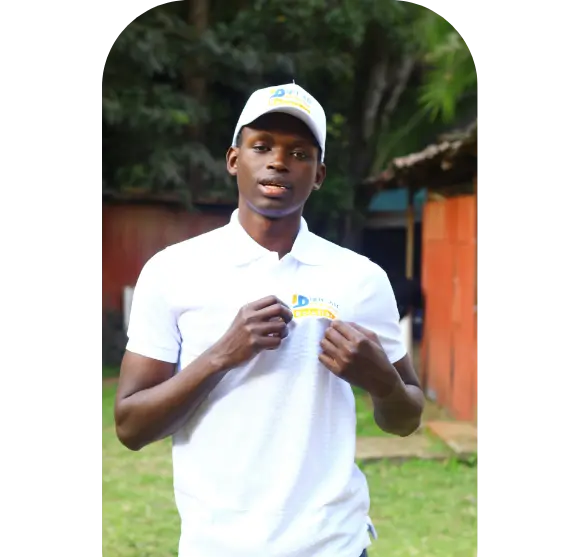 A picture of someone wearing a DMS shirt, holding the logo.